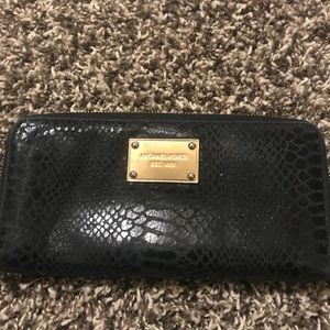 Michael Kors jet set black python wallet.